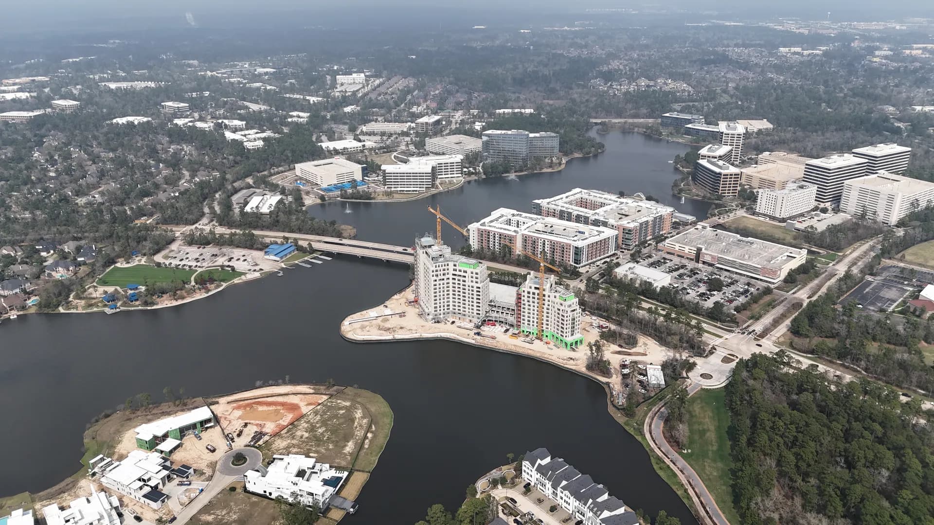 Aerial view of a Texas community skyline near a lake